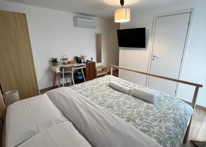 فندق مبيت وإفطار Sayonara